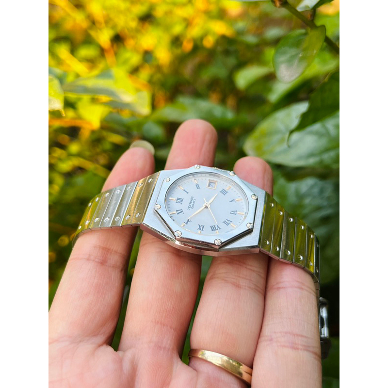 Đồng hồ Technos máy pin mặt bát giác cực cuốn