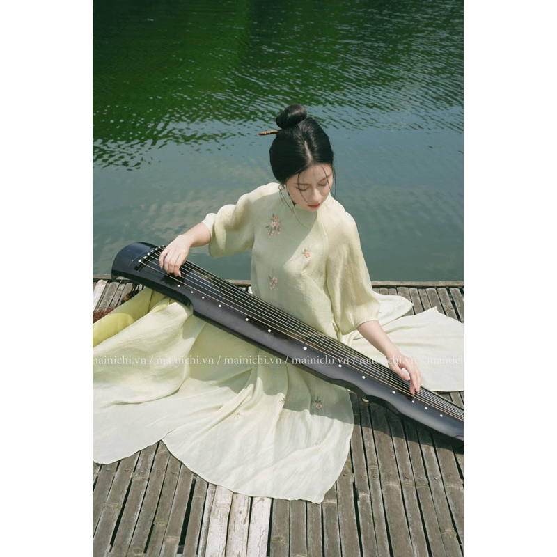 Áo dài xinh xanh bơ