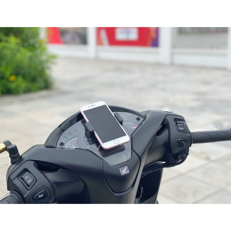 Kẹp điện thoai- Giá đỡ điện thoại dán lên đồng hồ xe máy