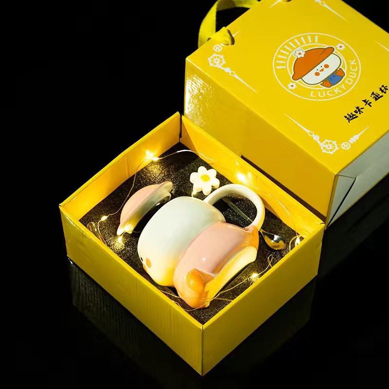 Cốc sứ hình chú vịt đáng yêu, ly sứ kèm thìa hoa cúc và ống hút thuỷ tinh