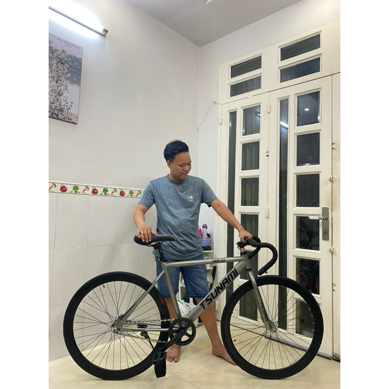 xe thể thao fixed gear và single màu xám ghi ( kèm strap và đồ lắp)