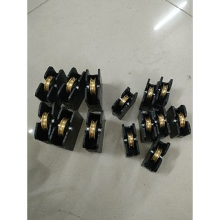 10 cái Bánh xe thau cửa lùa nhôm