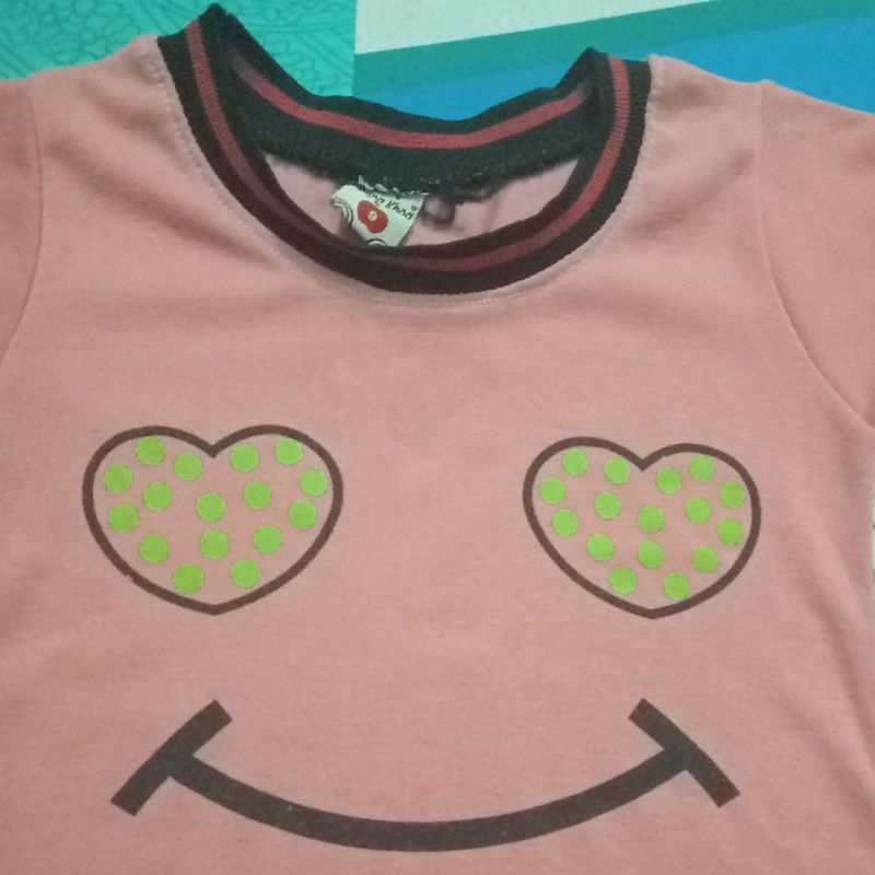 Đầm mặt cười cho bé