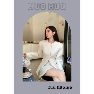 Set áo dạ trắng vạt chéo cùng chân váy sang chảnh