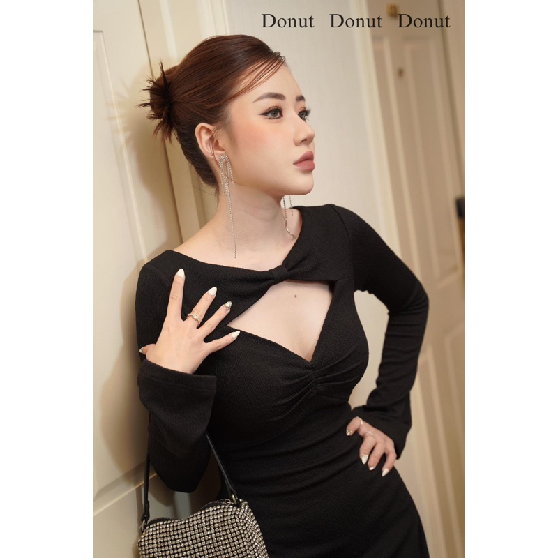 đầm đen xoắn