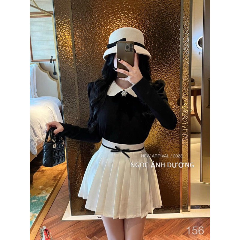 Set len gạo hàn có độn vai. Tang nơ đá nhung cài đẹp . Chân váy dạ xếp ly