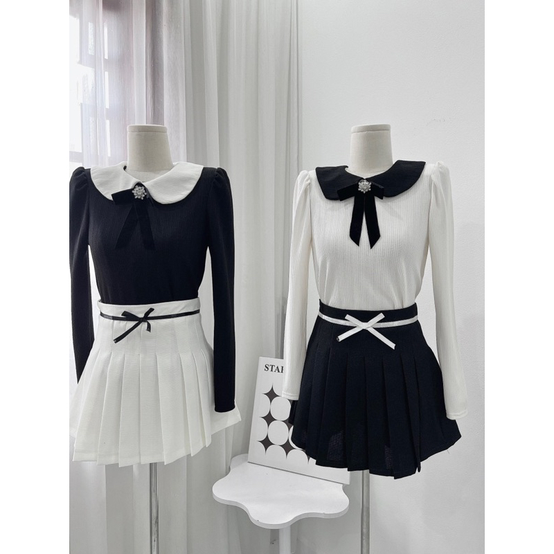 Set len gạo hàn có độn vai. Tang nơ đá nhung cài đẹp . Chân váy dạ xếp ly