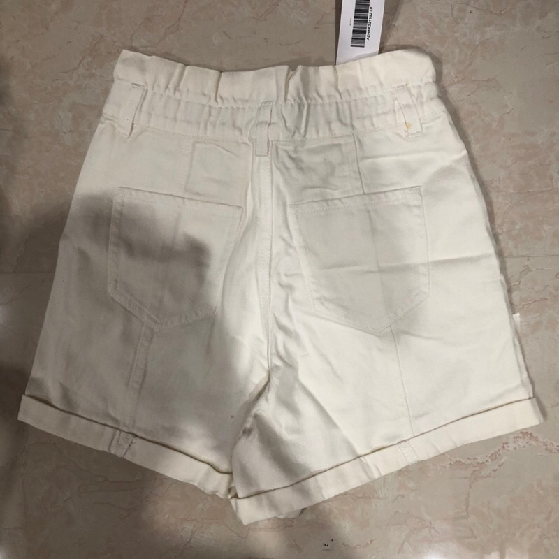 Quần short trắng Peacebird