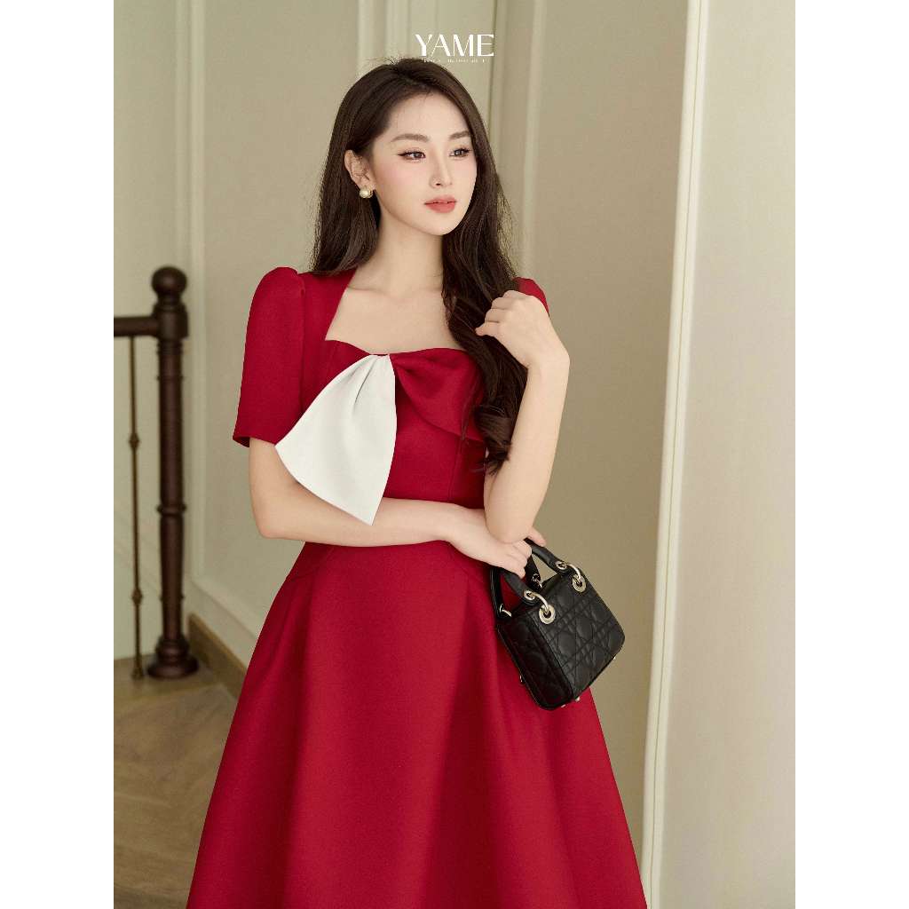 Váy dáng xòe YAME YV302 cổ xếp nơ lệch đỏ phối trắng dài 110cm