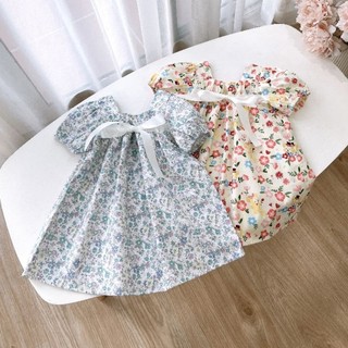Váy cổ vuông hoa nhí nơ ngực