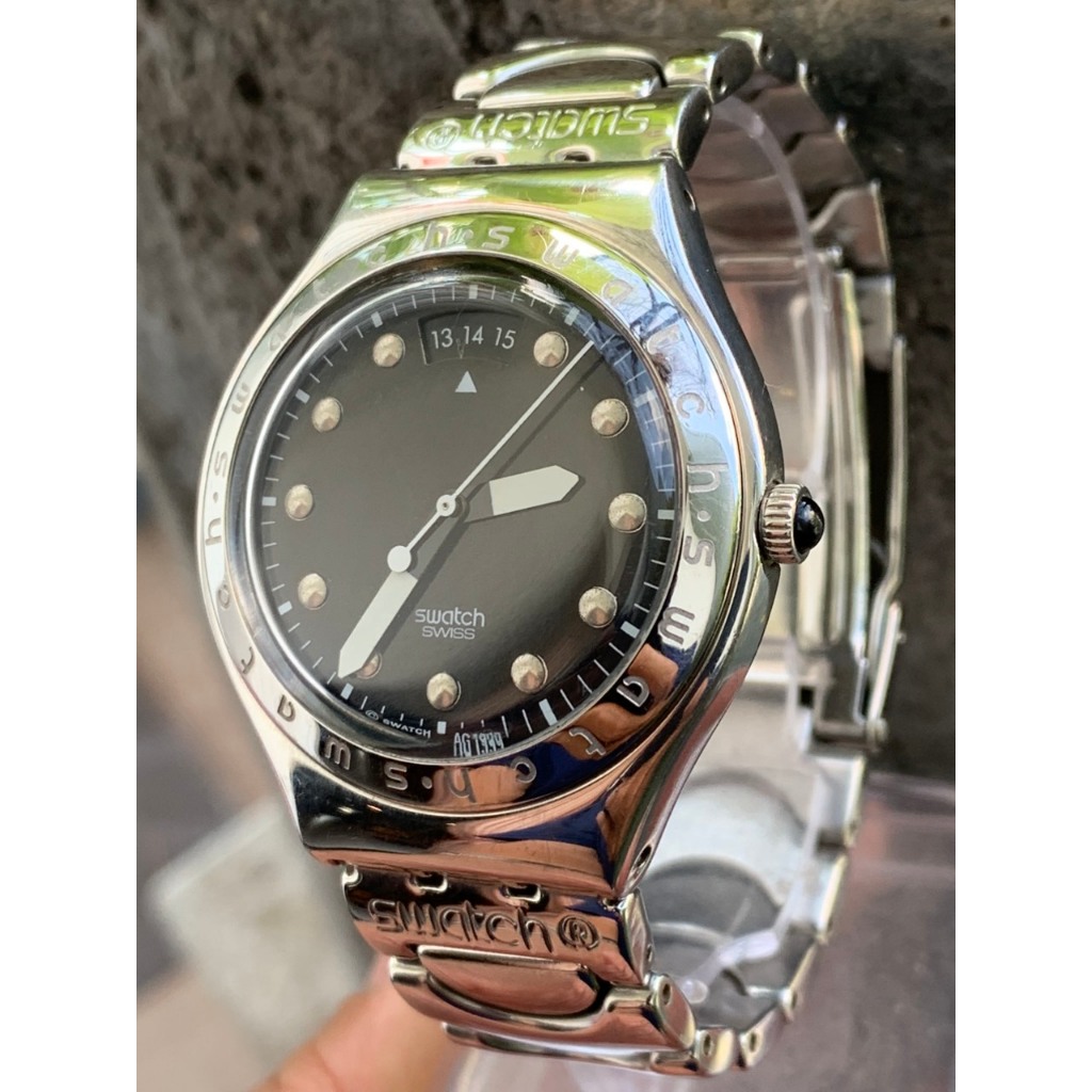 Đồng hồ nam Swatch Pin  kim dạ quang, dây kim loại  của Thuỵ