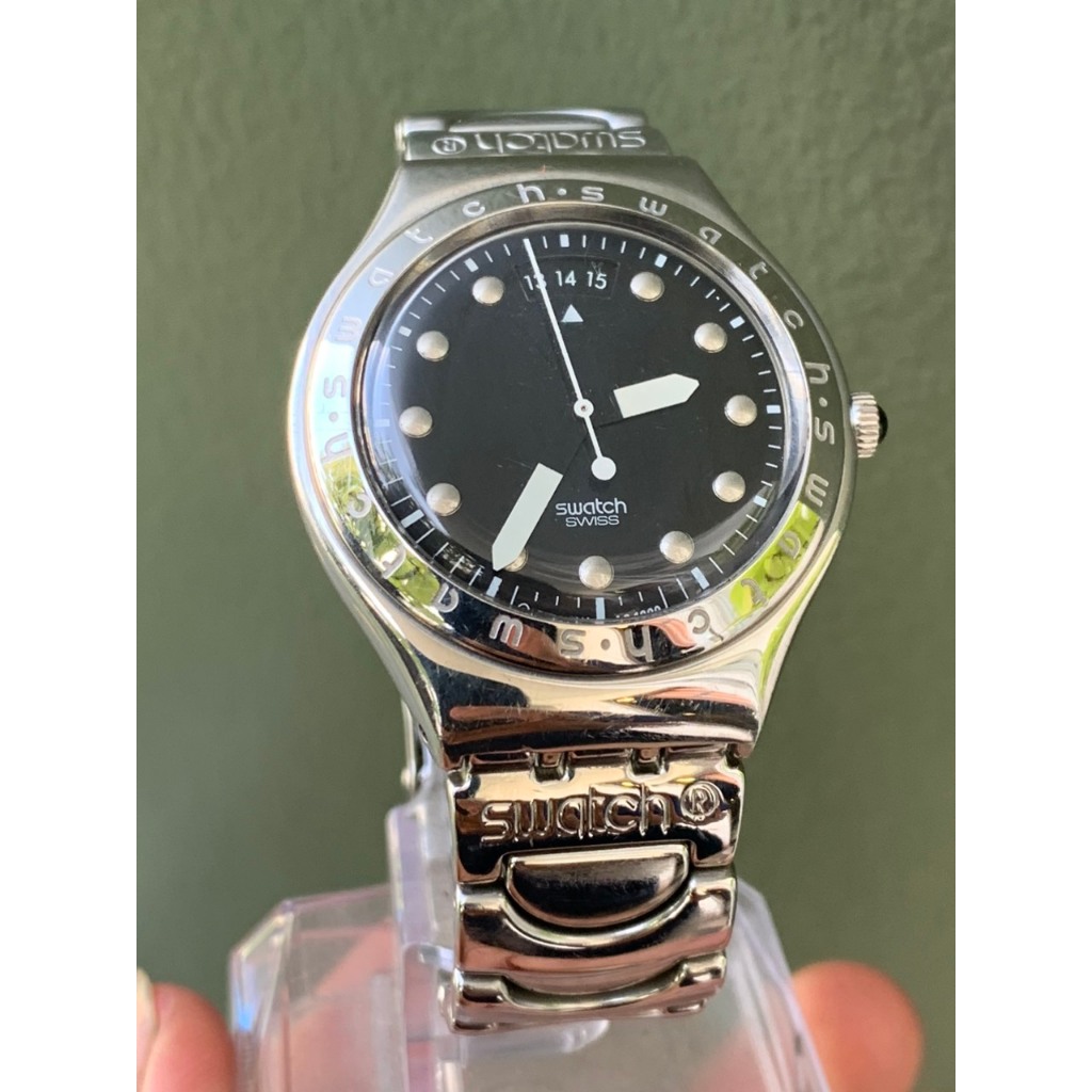 Đồng hồ nam Swatch Pin  kim dạ quang, dây kim loại  của Thuỵ