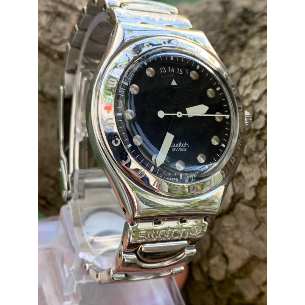 Đồng hồ nam Swatch Pin  kim dạ quang, dây kim loại  của Thuỵ