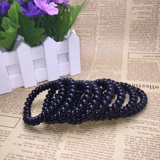 Buộc tóc lò xo