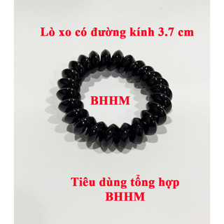 1 dây cột tóc lò xo bằng nhựa màu đen.