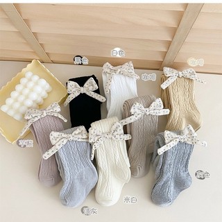 Quần tất len họa tiết vặn thừng cho bé màu trơn cotton đính nơ 1 bên điệu đà
