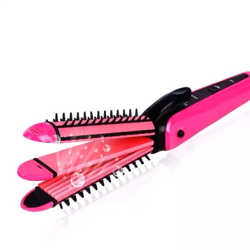 Lược điện máy làm tóc Nova 3in1 có 3 chức năng làm xoăn, uốn phồng, sấy cụp