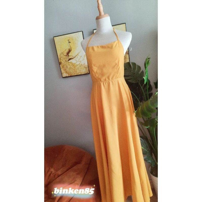 Đầm maxxi hở lưng tùng xéo
