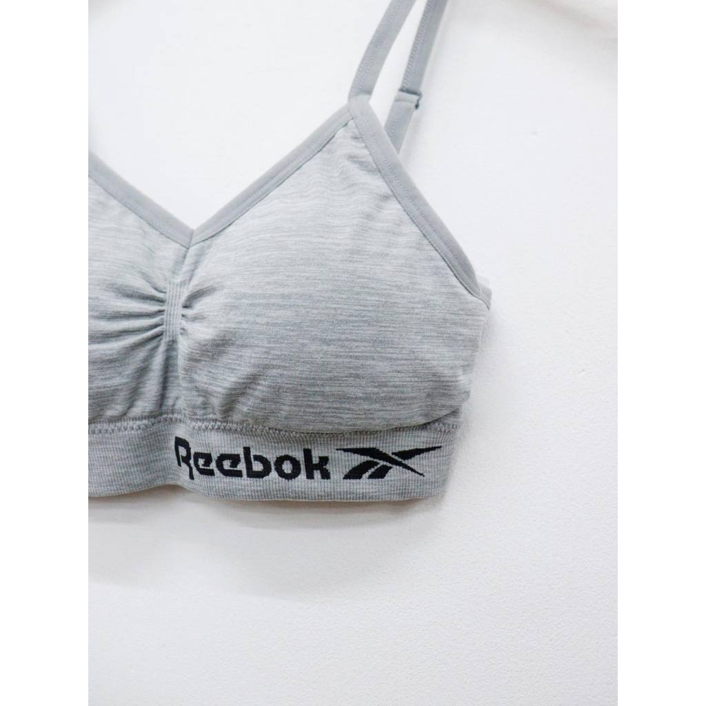 C4142 - Áo bra tập in chữ reebok viền nhún trước