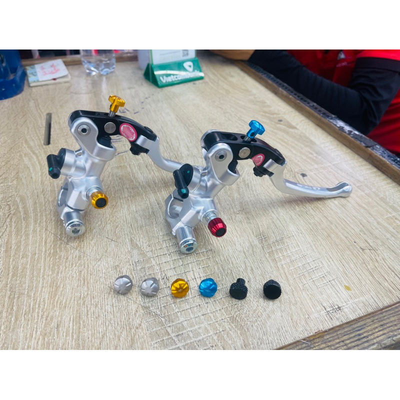 Núm tăng chỉnh gần xa , núm chụp ốc xả gió nhôm ghracing