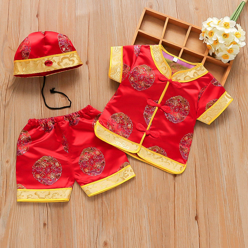 Bộ đồ tết bé trai kèm nón nút tàu chất gấm thêu hoa văn