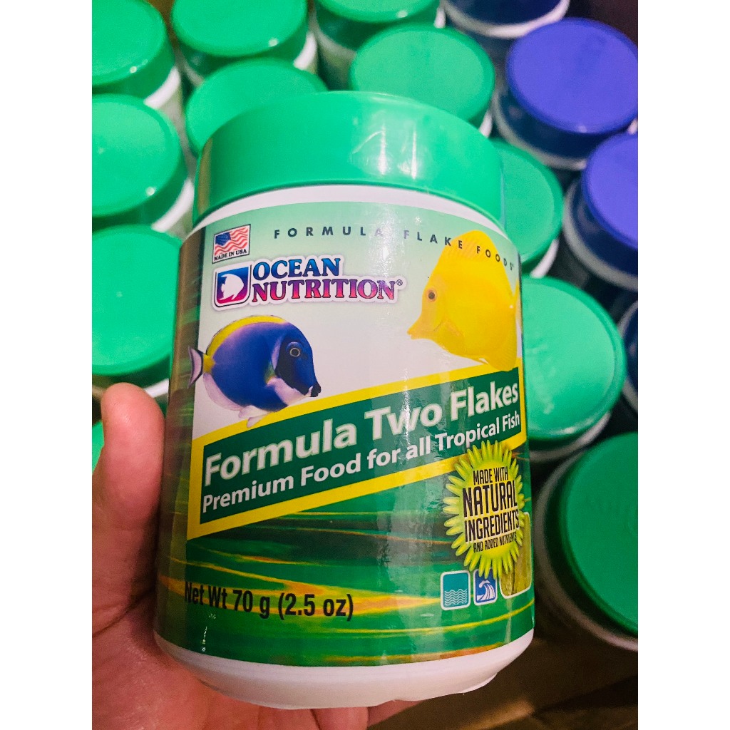 THỨC ĂN CỦA MỸ DÀNH CHO CÁ BIỂN OCEAN NUTRITION F2  HỘP MÀU XANH LÁ (DẠNG HẠT VÀ DẠNG LÁ)- OCEAN NUT