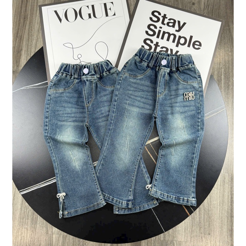 Quần loe m.i.u nơ bé gái