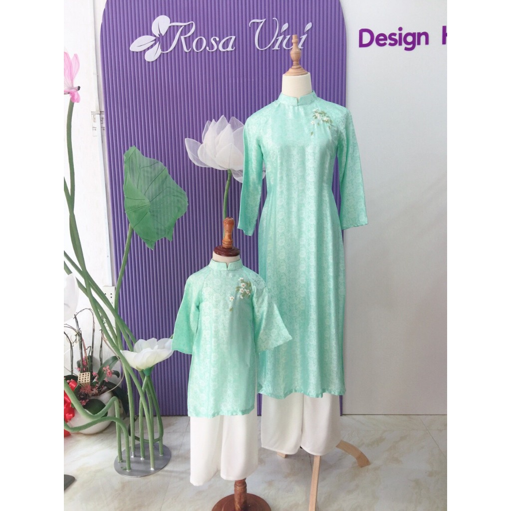 Áo dài Rosa Vivi tơ tằm xanh ngọc hoa cúc