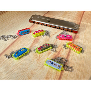 Kèn mini harmonica 4 lỗ hoạt hoạ dây chuyền