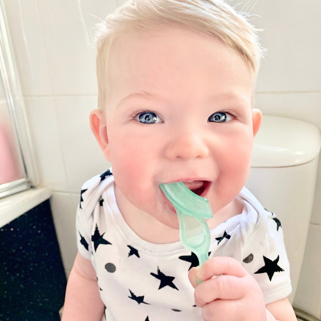 Brush-Baby Bàn chải tập đánh răng và mát xa nướu silicone mềm mại cho bé (10 - 36 tháng)