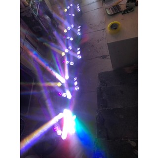 Đèn Moving 9 mắt to + laser+ chớp (3 in 1)