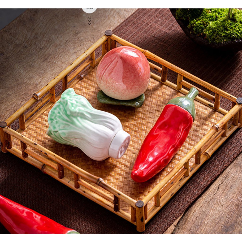 Hũ đựng trà bằng gốm sứ hình quả đào may mắn, trưng bày trang trọng, đựng trà quà tặng ý nghĩa.