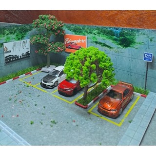 Diorama 1:64 bãi đỗ xe cây táo