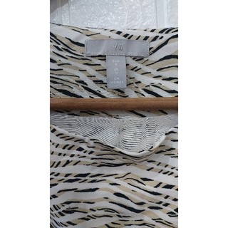 Đầm hiệu size M nữ ngực 96cm, dài 90cm.
