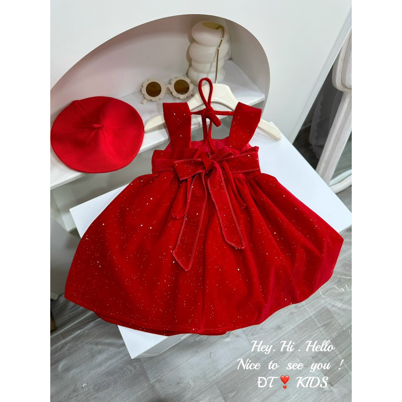 Váy nhung 2 dây bản to cúc giữa bé gái