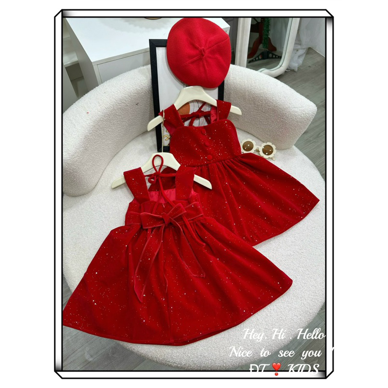 Váy nhung 2 dây bản to cúc giữa bé gái