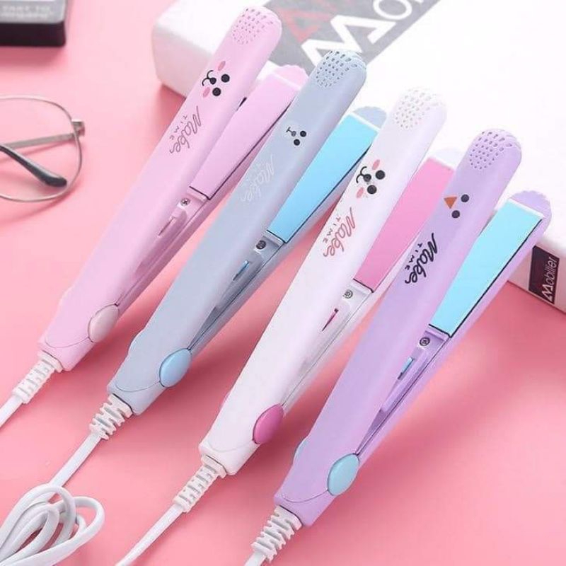 Máy duỗi, là tóc , máy dập xù mini
