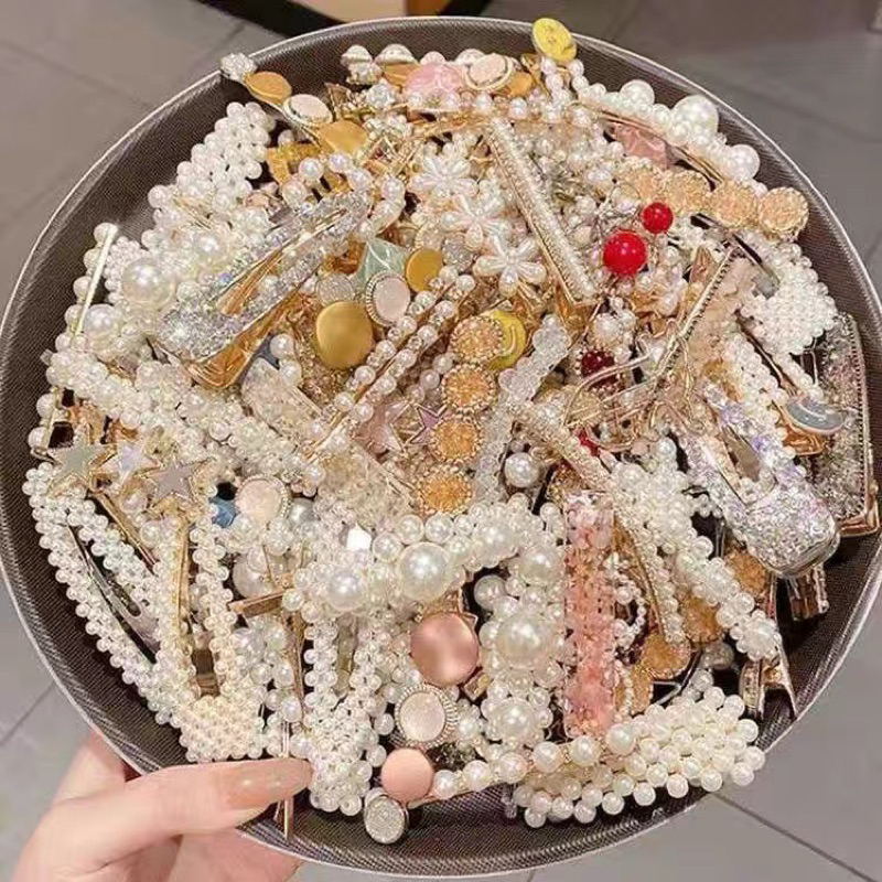 Kẹp tóc ngọc tra.i