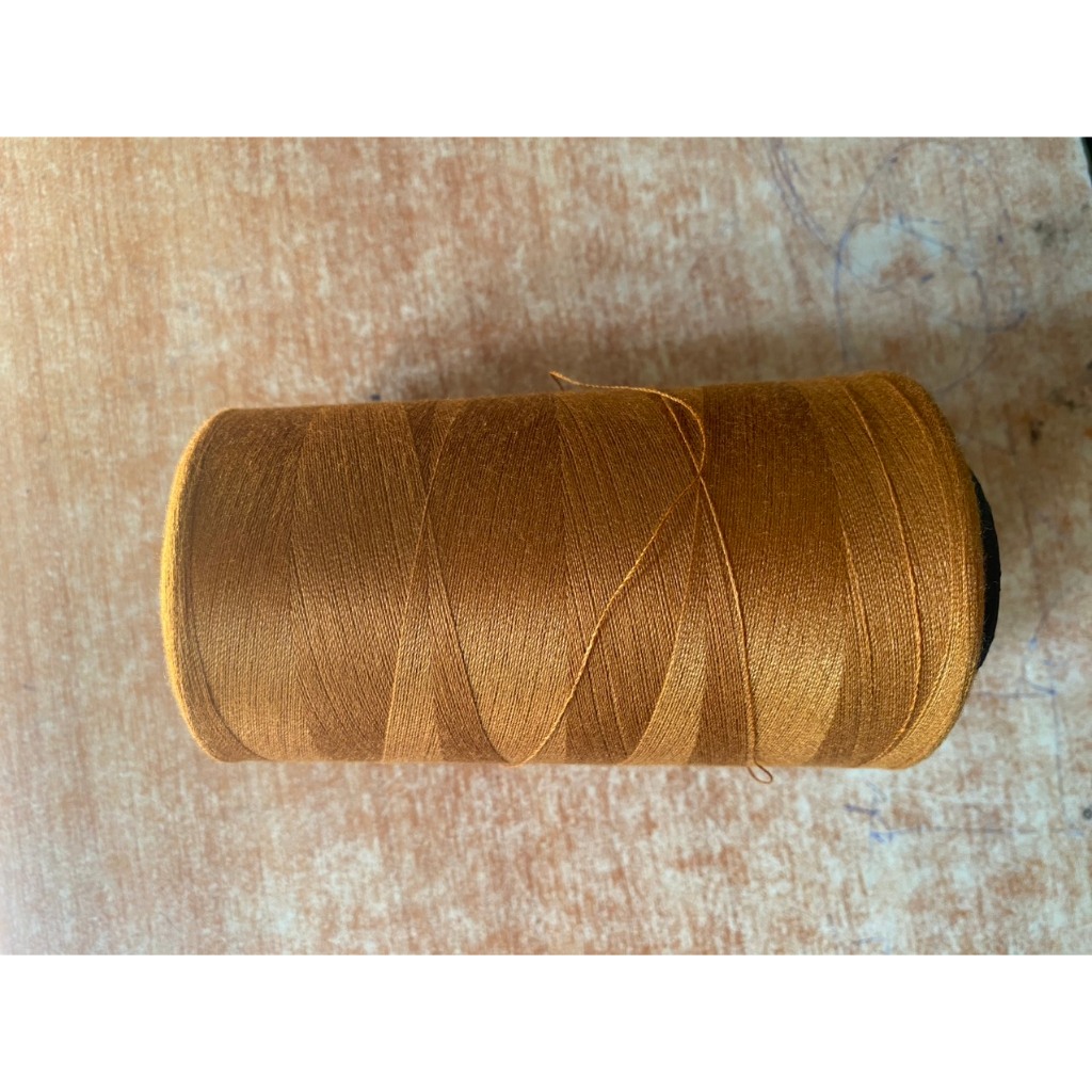 Chỉ may màu vang bò