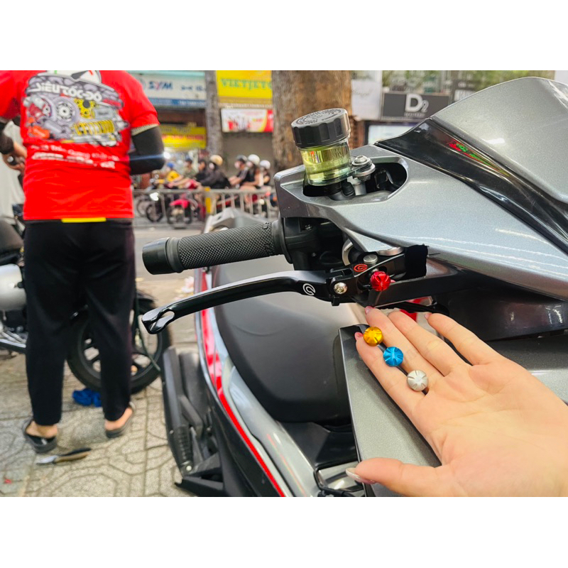 Núm tăng chỉnh gần xa , núm chụp ốc xả gió nhôm ghracing