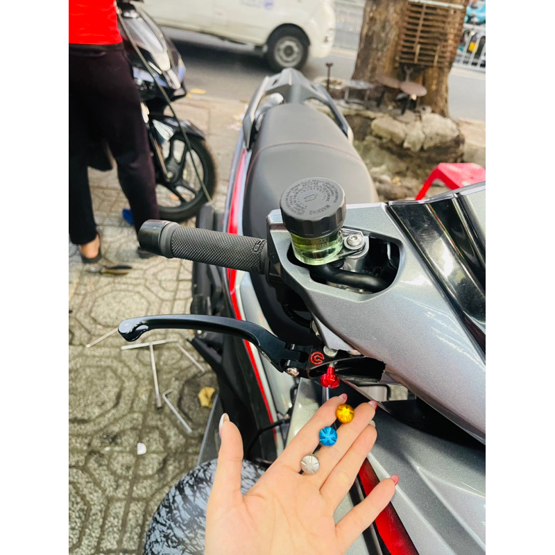 Núm tăng chỉnh gần xa , núm chụp ốc xả gió nhôm ghracing