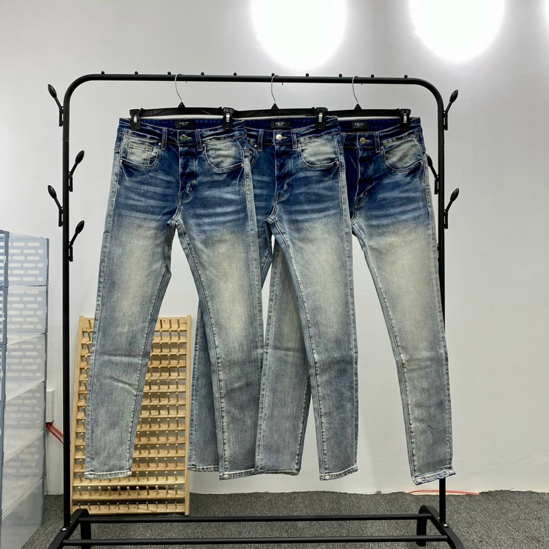 Quần Jeans AMIRI Xanh Ánh Vàng 3574, 4 Cúc Full Chữ, Phom Ôm