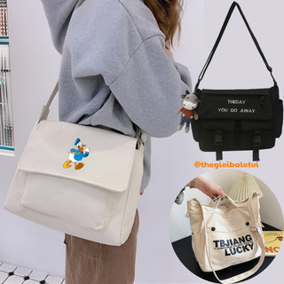 Túi đeo chéo nam nữ đi học đi chơi vải canvas đựng vừa a4, cặp đeo chéo trắng đen nhiều ngăn có khóa