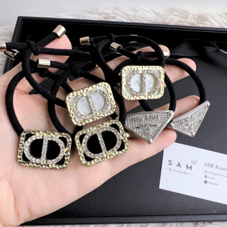 Dây buộc tóc nữ logo hãng