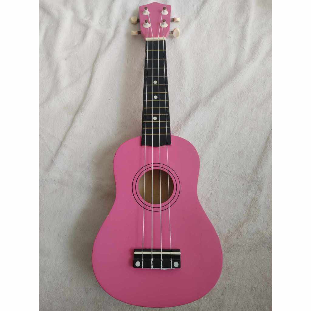 Soprano Ukulele màu hồng Full gỗ