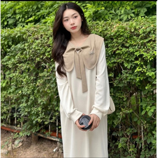 Váy xuông cổ nơ đính tag