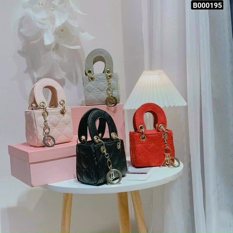 Túi la dy di ô mini cầm tay ,đeo chéo sz 12 xinh lắm ạ