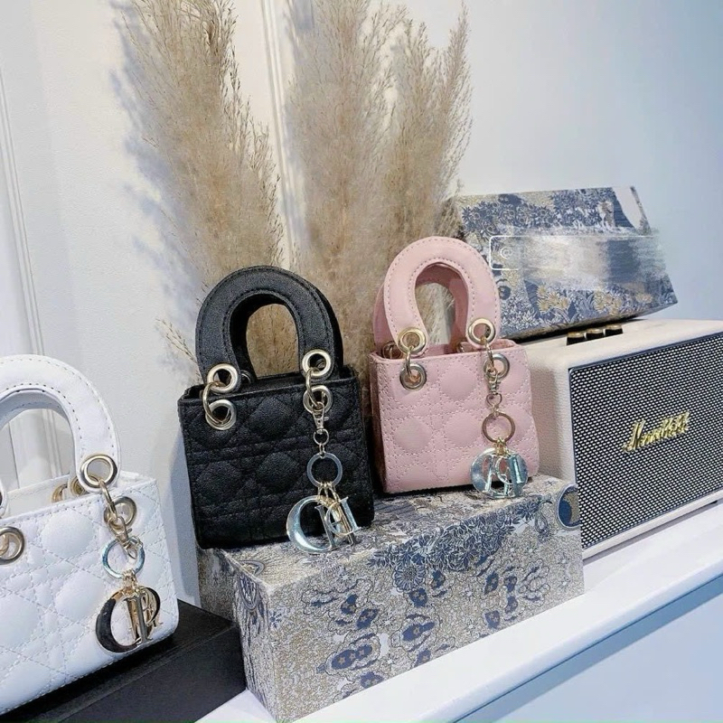 Túi la dy di ô mini cầm tay ,đeo chéo sz 12 xinh lắm ạ