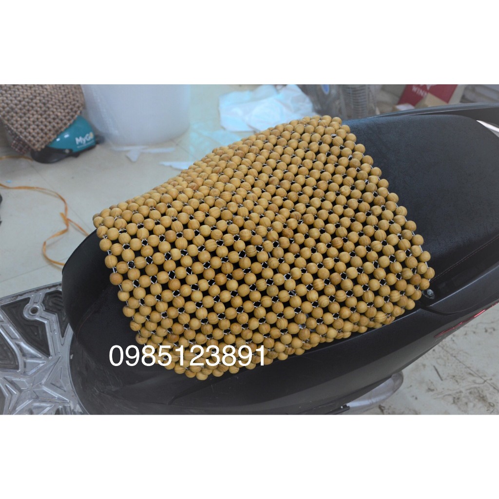 Đệm hạt gỗ lót ghế văn phòng, ô tô, Xe máy gỗ thông cao cấp đan dây dù thủ công chắc chắn giá tại xưởng Làng Nhị khê