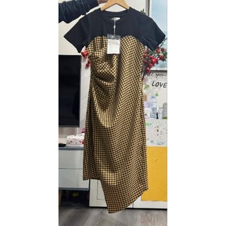 Đầm kẻ tà lệch hàng thiết kế